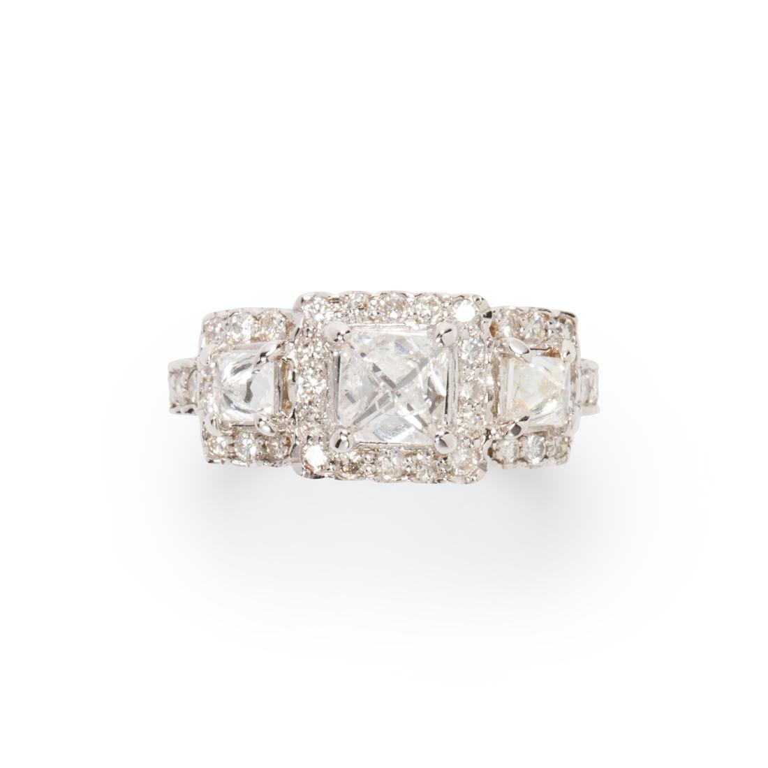 A diamond and eighteen karat white gold ring (1 of 2)