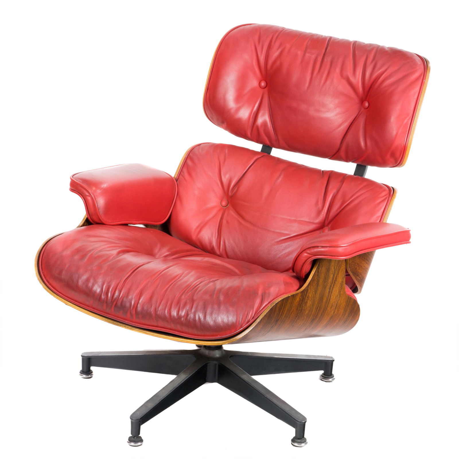 Charles and Ray Eames, 670 lounge chair: Charles and Ray Eames, 670 lounge chair Herman Miller, 1970-1984, red leather and rosewood, 32.5"h, with Herman Miller label to underside