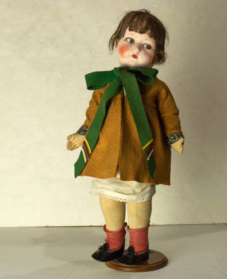 Vintage papier mache and cloth doll: Vintage papier mache and cloth doll, with painted face and eyes and jointed body, 20"h