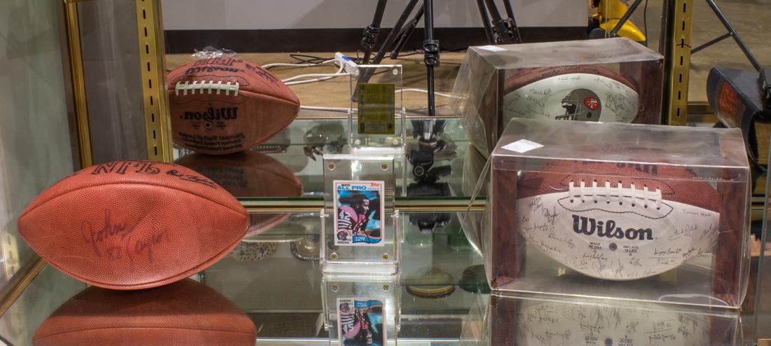 (lot of 3) San Francisco 49ers ephemera: (lot of 3) San Francisco 49ers ephemera, consisting of John Taylor autographed Wilson football; Ronnie Lott autographed card in acrylic case and a boxed 1990 Wilson football with facimile team signatu