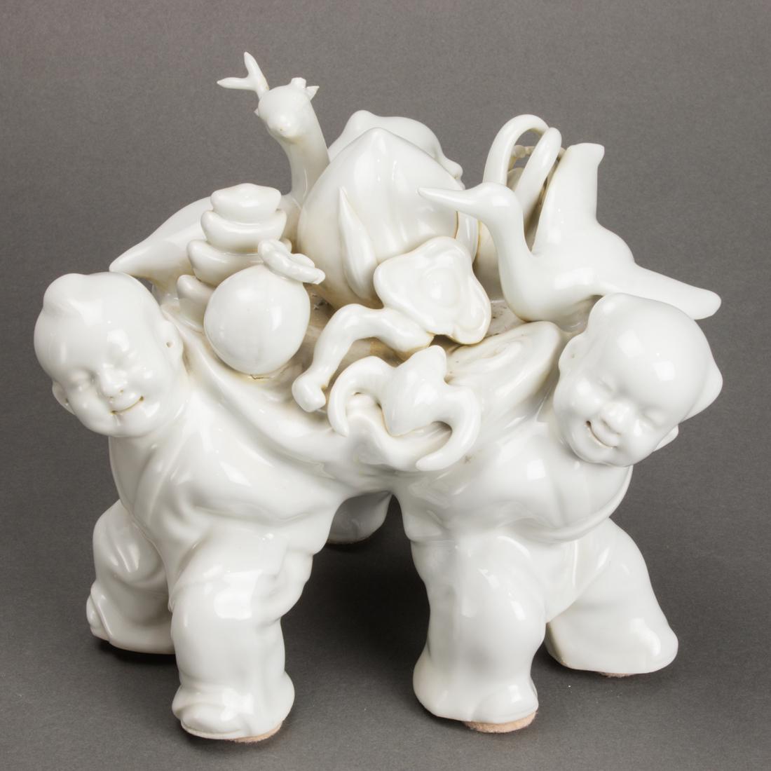 Chinese blanc de chine figures of boys (1 of 1)