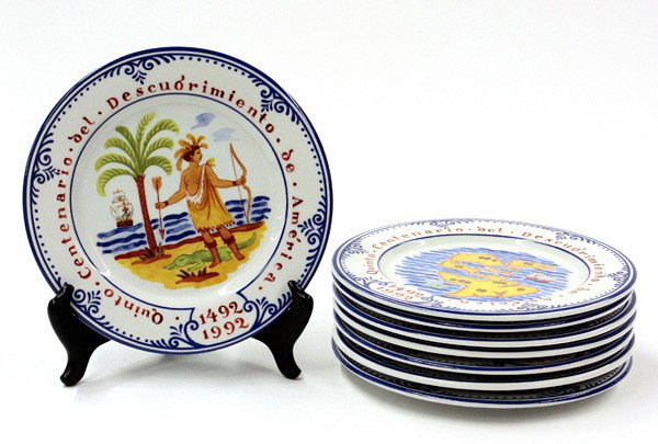 Tiffany and Co. dessert plates: (lot of 8) Tiffany and Company dessert plates, the polychrome decorated plates commemorating the five hundred year anniversary of Columbus' historic voyage, the border with Quinto Centenario del Descu