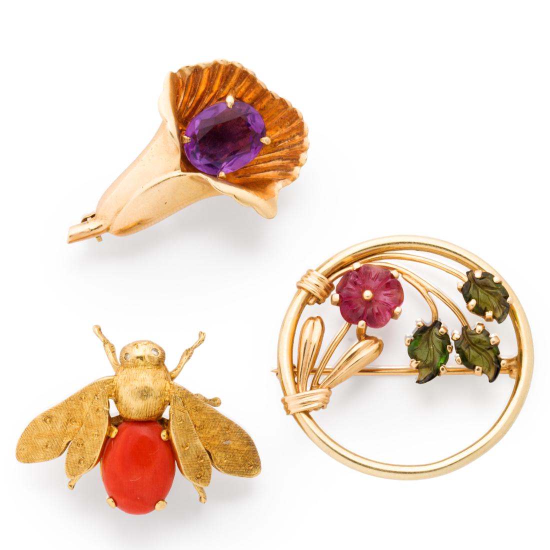 A group of gemstone and gold brooches (1 of 1)
