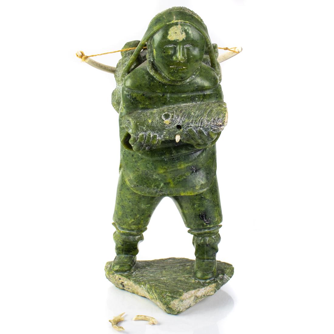Soapstone figure of hunter with bow: An Inuit soapstone figure of a hunter with bow, 14.5"h