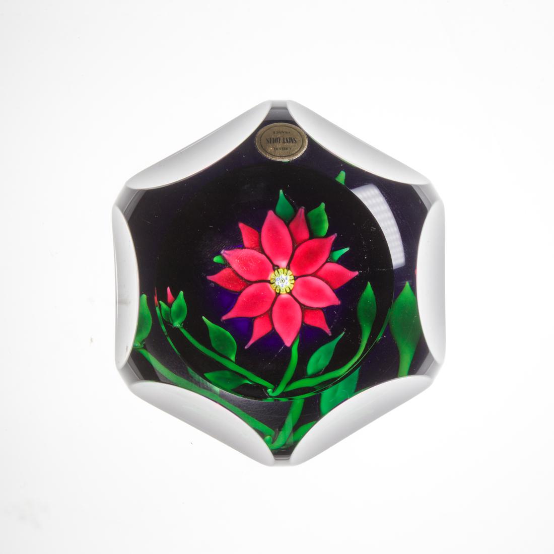 A Saint-Louis glass poinsettia faceted glass paperweight (1 of 2)