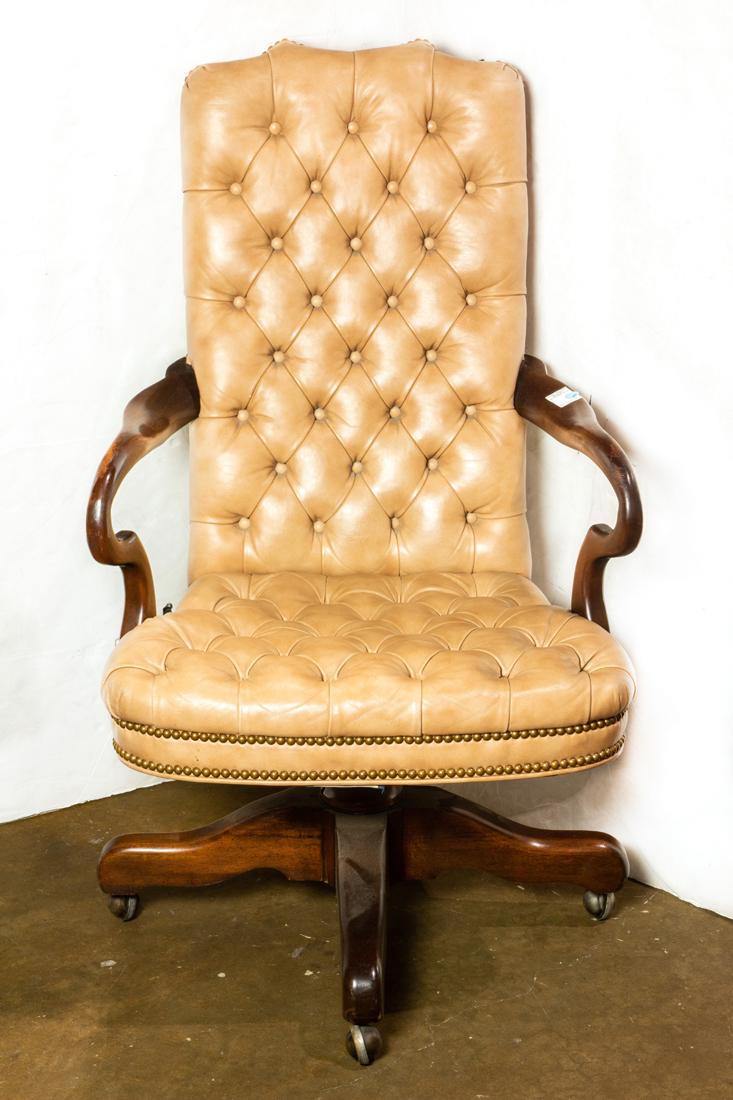 A Chesterfield style office chair, having a tufted back, 44"h (1 of 1)