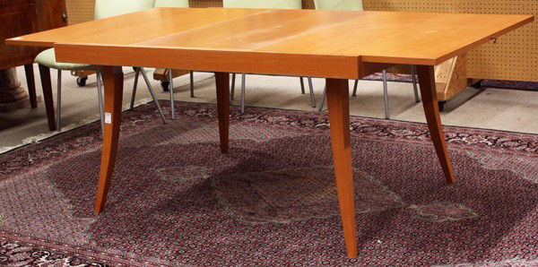 Ligne Roset dining table and chairs: (lot of 5) Ligne Roset dining table and chairs, circa 1990, the table with a single extension leaf, and raised on tapered outswept legs, together with four Calin chairs, upholstered in a light viridia