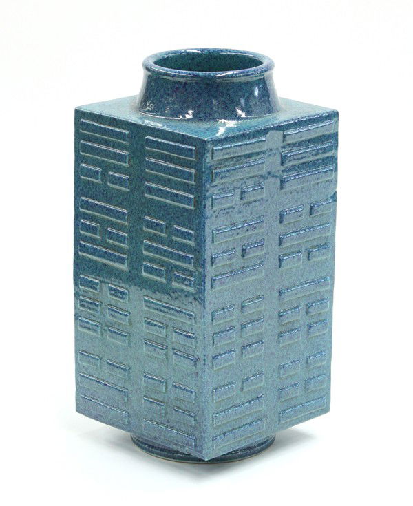 Chinese Robin's Egg Blue Glazed Porcelain Vase: Chinese robin's egg blue glazed archaistic vase, fashioned as a cong with each of the rectangular sides molded with the Eight Trigrams and raised on a circular base, the tapering circular neck flaring