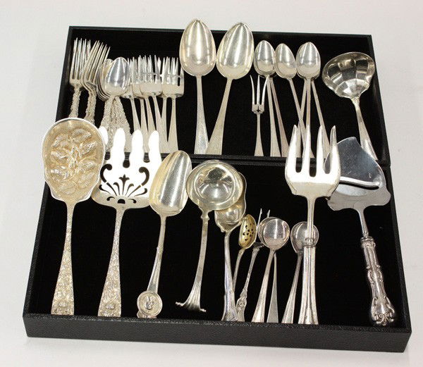 Assembled sterling flatware: American sterling silver assembled flatware consisting of six teaspoons and luncheon forks in the ''Waverly'' pattern and six iced teaspoons, ladle in the ''Carmel'' pattern by Wallace Silversmiths; s