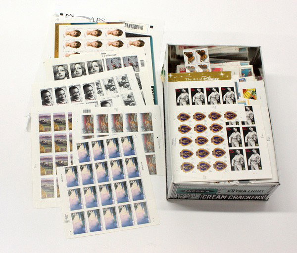 US Mint postage stamps: Lot of US Mint postage stamps, including: singles, partial sheets and blocks, over $1,000 dollars in face value