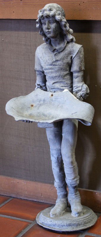 Renaissance style lead garden figure: Renaissance style continental lead garden figure, circa 1850, the young man dressed in period attire, his hand are holding out a platter, the whole sculpture is raised on a round plinth, 52''h x 22''w