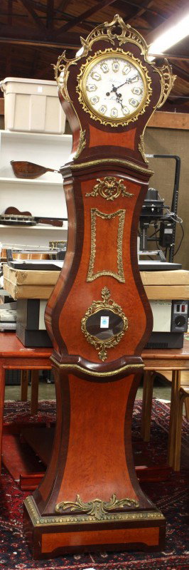 Louis XV style tall case clock: Louis XV style tall case clock, the ormolu style mounted and inlaid case housing an enamel decorated Bolomey A' Montreaux dial having raised roman numeral markers and rising on a rectangular plinth, 8