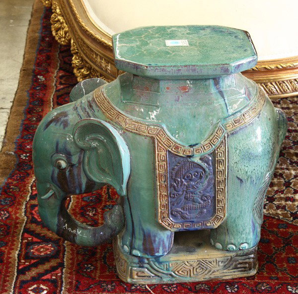 Asian garden stool: Asian elephant ceramic garden stool, executed in a high glaze and rising on an incised plinth, 20''h x 9''w x 20''d