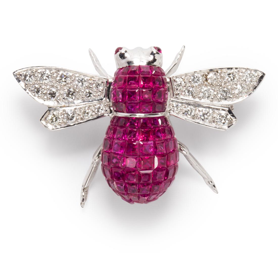 A ruby, diamond and eighteen karat white gold brooch (1 of 1)