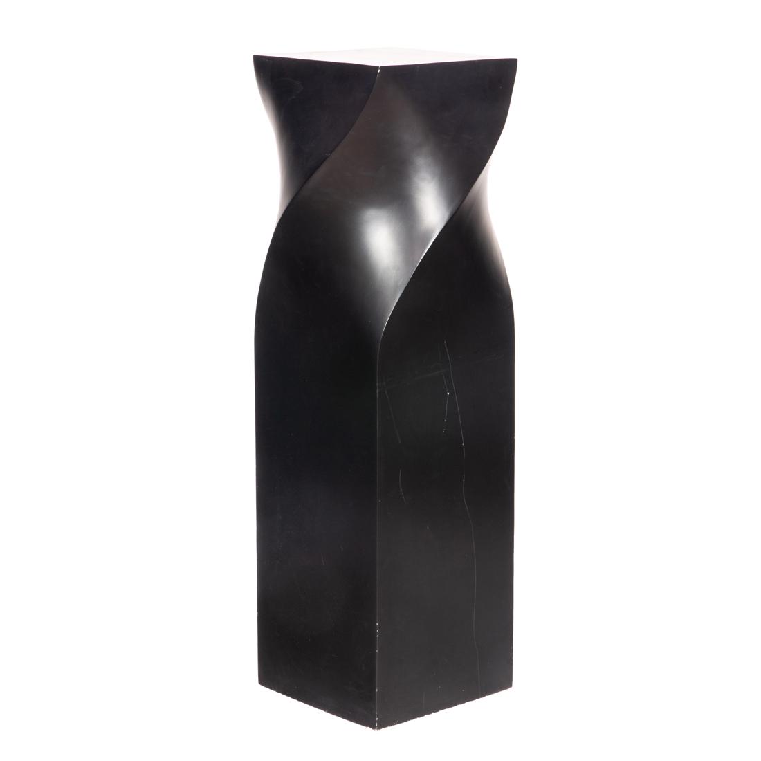 A Moderne black pedestal: A Moderne black pedestal, 50.5"h x 14.5"dia.