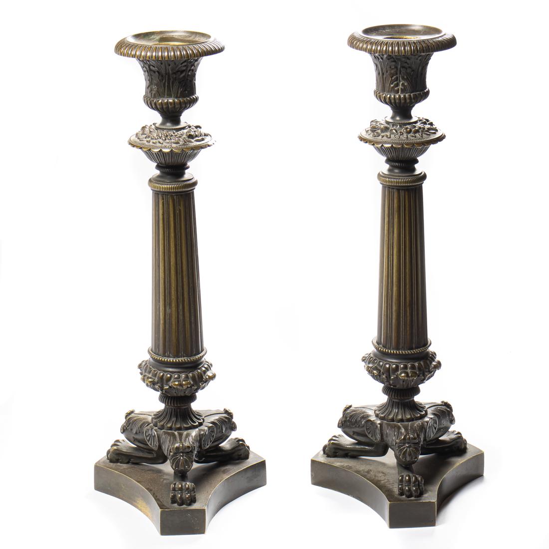 A pair of Louis Philippe patinated bronze candlesticks (1 of 3)