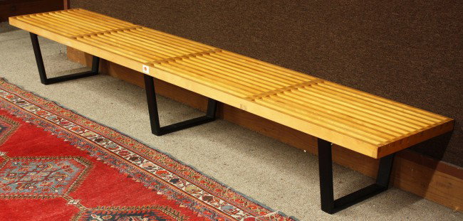 George Nelson slat platform bench No. 4693: George Nelson (1908-1986) slat platform bench model number 4693 El-Eb, for Herman Miller, circa 1950, constructed with a natural birch slat surface, and rising on ebonized legs, Note: this is the larg