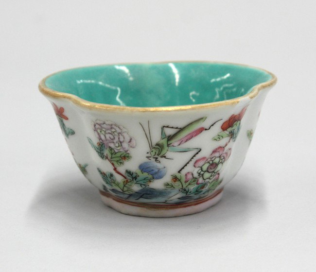 Chinese Enameled Porcelain Cup, Tongzhi Period: Chinese polychrome enamel decorated porcelain cup, Tongzhi mark and period, of tri-lobed shape and painted on the tapering sides with insects and flowering sprays, the interior glazed turquoise, furth