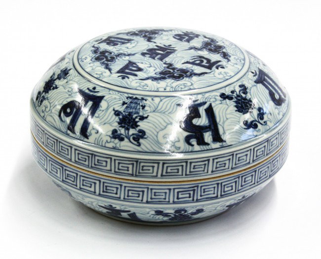 Chinese Blue/White Porcelain Covered Box: Chinese blue-and-white porcelain box with Buddhist decoration, of circular shape with a flattened dome-form lid painted in shades of underglaze blue with sacred Siddham characters amid cloud scrolls o