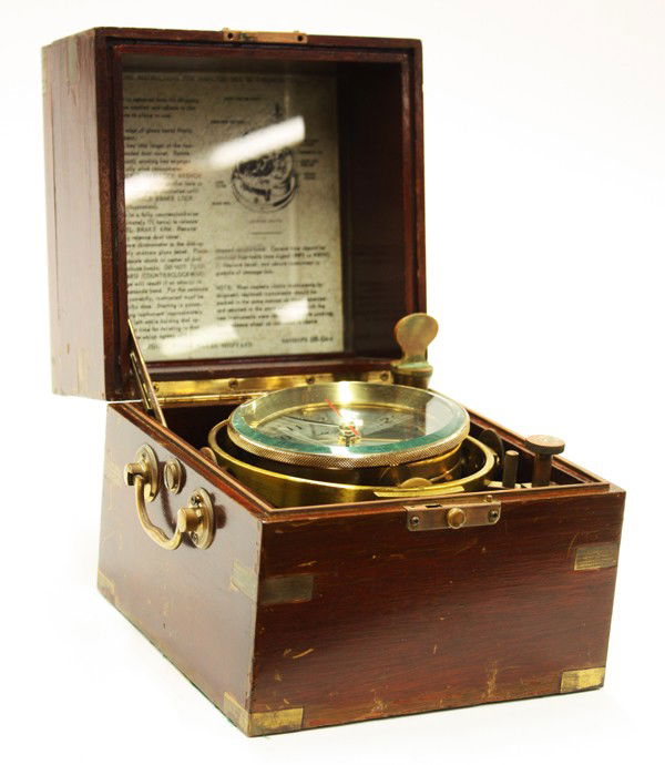 Seth Thomas clock in a Hamilton Chronometer case: Seth Thomas Gimbaled clock, in a Hamilton mahogany chronometer case, 7.5''h x 7.75''w x 7.75''w