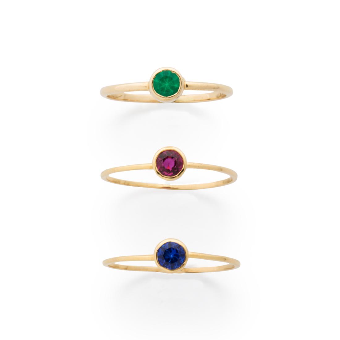 A group of gemstone and fourteen karat gold stacking rings (1 of 2)