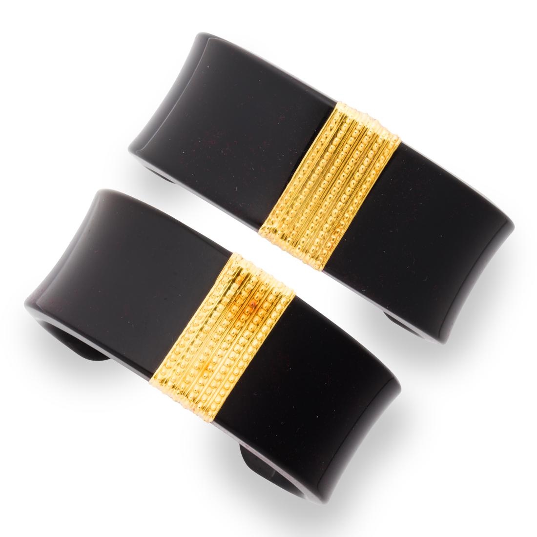 A pair of black chalcedony and eighteen karat gold bracelets (1 of 3)