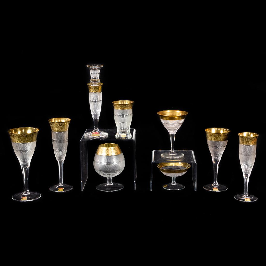 (lot of 59) A Moser cut glass and tooled gilt suite of stemware in the Splendid pattern: (lot of 59) A Moser cut glass and tooled gilt suite of stemware in the Splendid pattern, late 20th century, each with acid etched factory mark, many with foil labels, comprising (6) tall water goblets