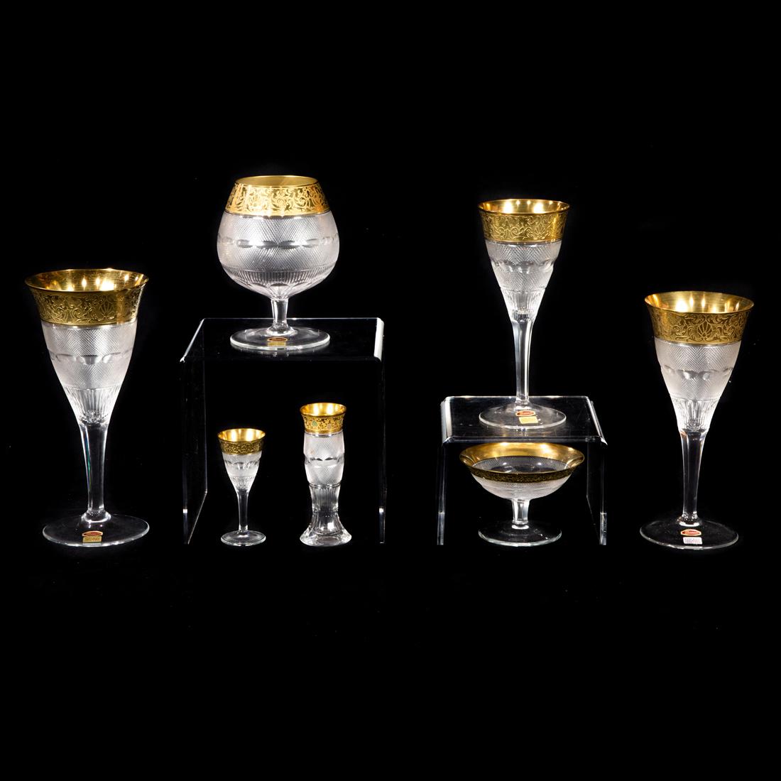 (lot of 41) A Moser cut glass and tooled gilt suite of stemware in the Splendid pattern: (lot of 41) A Moser cut glass and tooled gilt suite of stemware in the Splendid pattern, late 20th century, each with acid etched factory mark, many with foil labels, comprising (8) tall water goblets