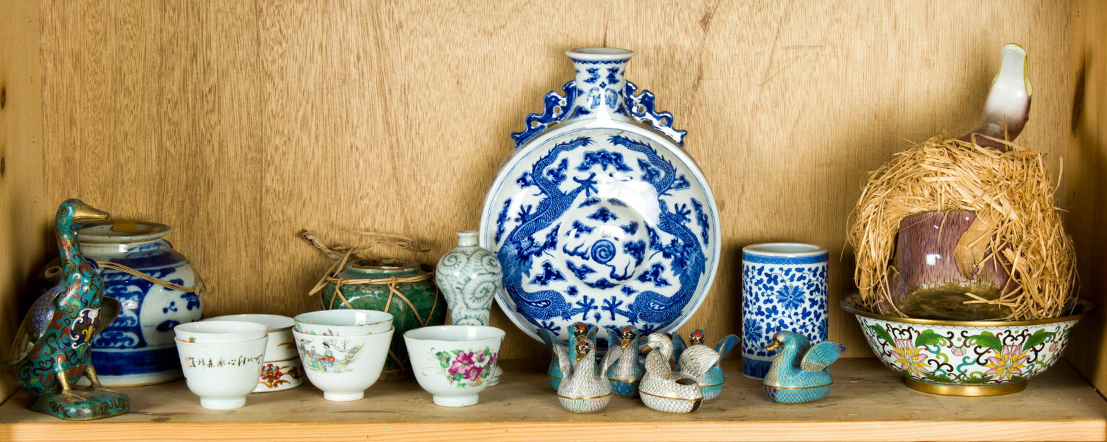 Shelf of miscellaneous Chinese decorative items (1 of 1)