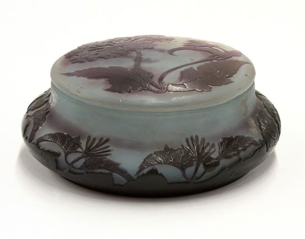 Emile Galle cameo box: Art Nouveau Emile Galle cameo box, executed in two colors from aubergine cut to sky blue, the lid having a floral spray above the squat body with foliate banding and signed Galle, 2''h x 5.75''w