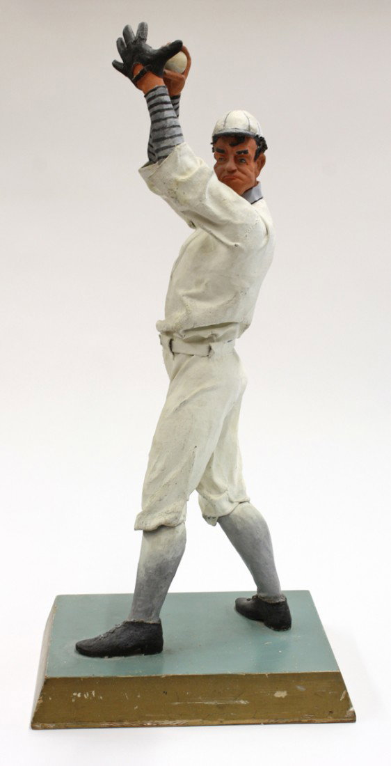 Folk Art baseball player: Folk Art baseball player sculpture circa 1930, executed in cloth and Plaster of Paris, the polychrome decorated figure depicted as a pitcher gazing at his target, rising on a partial gilt wood plinth,