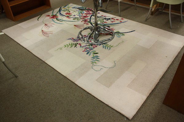 Edward Fields area rug: Edward Fields, U.S.A, wool area rug, executed in the ''Bottanica Loop and Cut'' design in multiple colors, retains original tag on underside, 5'6'' x 8'6''