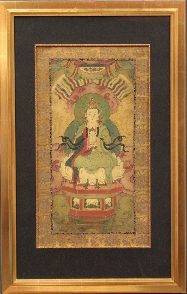 Japanese Buddhist Painting, Edo: Framed Japanese religious painting, Edo period, ink and color on paper, the richly adorned Buddhist or Daoist figure seated in a pose of meditation on a lotus pedestal raised on a high plinth, his han