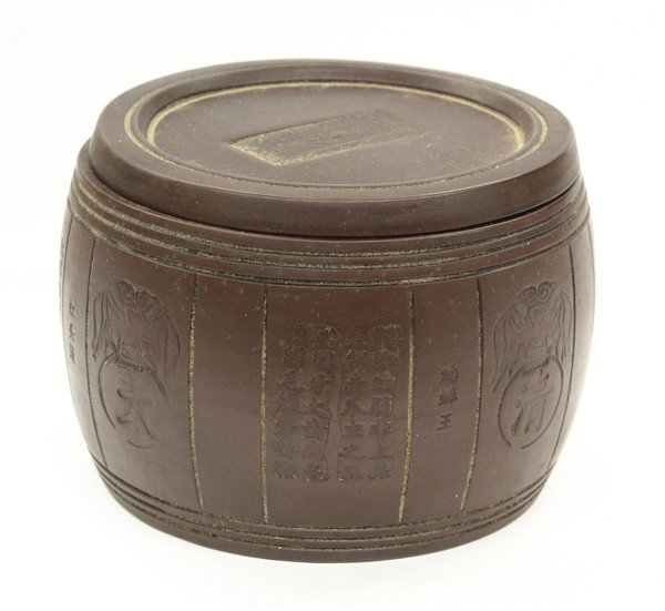 Chinese Yixing Cylindrical Box: Chinese Yixing covered cylindrical cricket jar, the drum-form body featuring stylized bats perched on medallions with the characters 'da qing qian long' alternating with descriptions on various types 