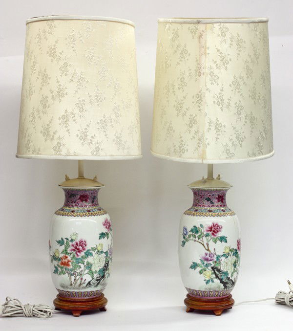 Chinese Famille Rose Porcelain Lamps/Vases: Pair of Chinese polychrome enameled porcelain vases, now electrified, each ovoid body vividly enameled with peonies of red, blue, yellow and purple hue, together with a poetic inscription and painted