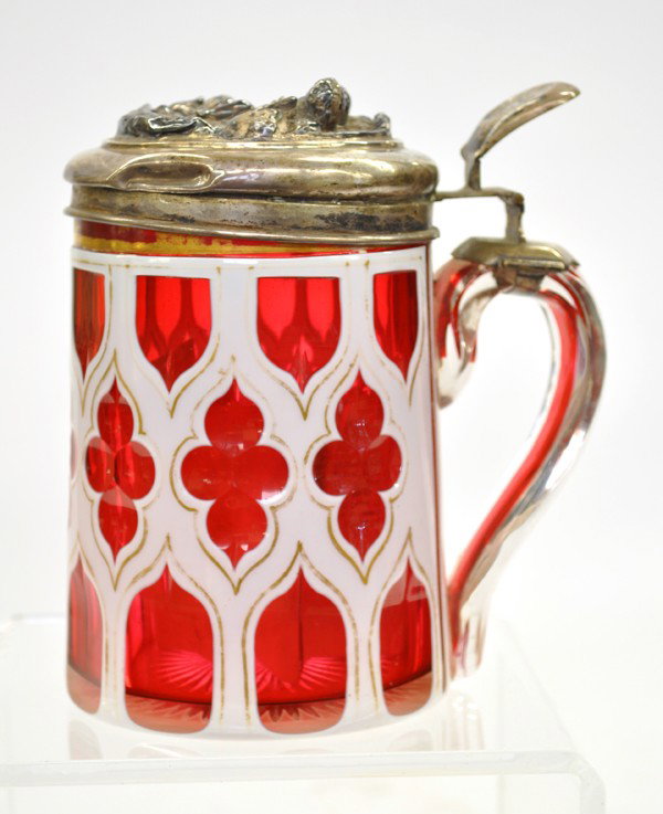 German glass tankard: Antique German white and gilt enameled red glass tankard with a silver lid, purportedly belonged to (Earl) Fretherr Von Bar Mecklenburg and has his coat of arms