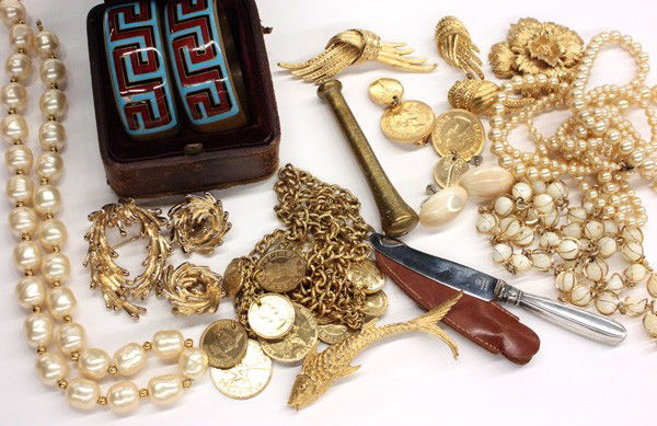 Collection of jewelry items: Collection of miscellaneous jewelry items, including; enamel bracelets in a Tiffany box; two MONET earrings and brooch jewelry sets; three beaded necklaces; two pairs of screw on earrings; two MONET b