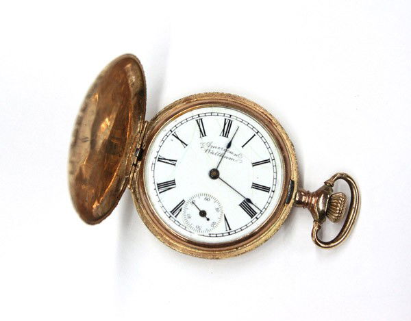 Hunting cased pocketwatch: Hunting cased American Waltham pocketwatch, circa 1893; of 14k yellow gold, with Roman dial, spade hands and subsidiary seconds, bow and crown at 3:00, engraved 34 mm case. Willian Glover Jr., Hazelto