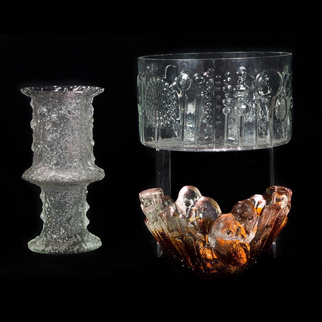 (Lot of 3) Scandinavian glass vessels: (Lot of 3) Scandinavian glass vessels, comprising a Iittalia Nardus vase designed by Timo Sarpaneva, 10.25"h; Iittalia Flora bowl designed by Oiva Toikka, 9.5"dia and Humpplia bowl with birds designed