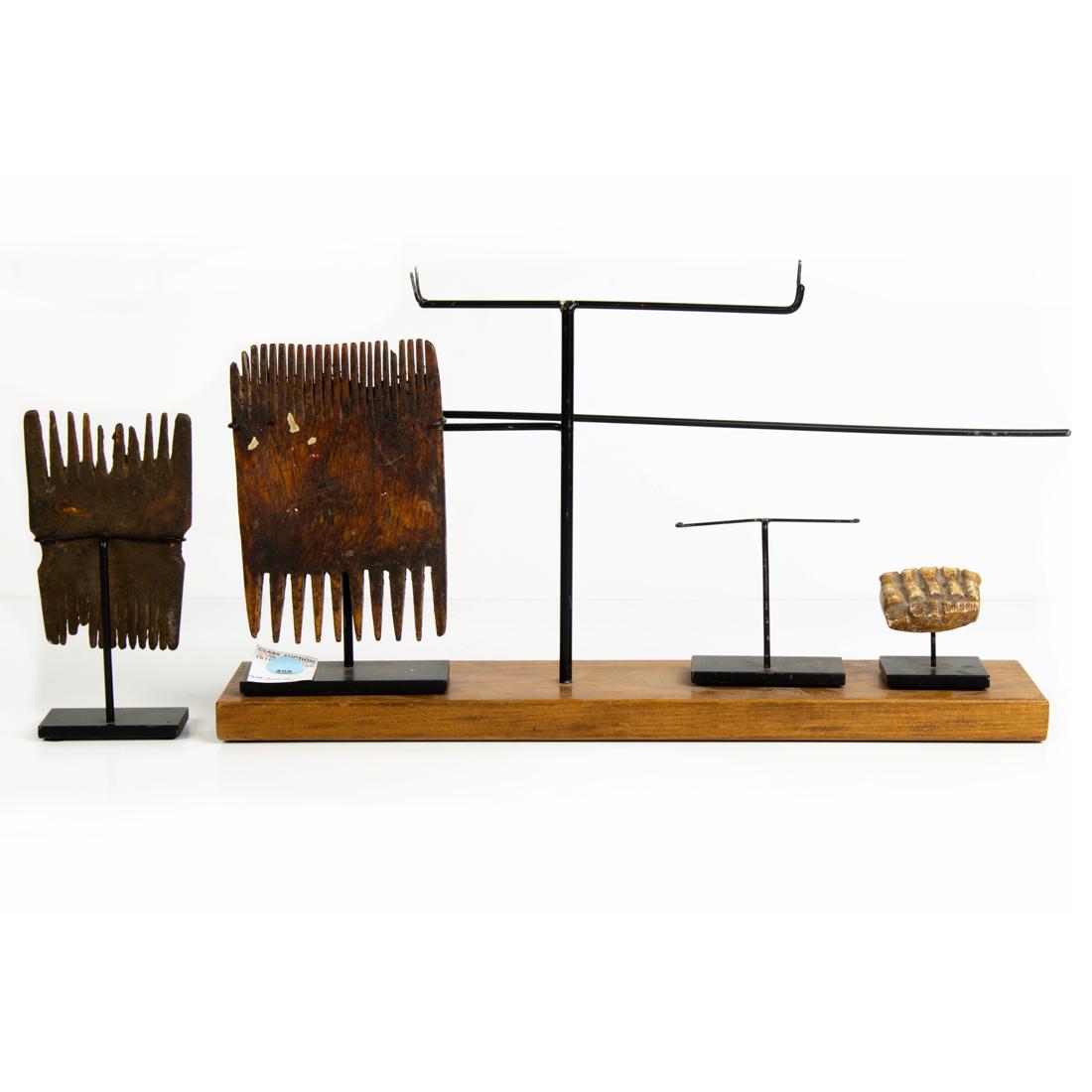 (lot of 3) Two Tribal combs on stands, together with a small figural sculpture (1 of 1)