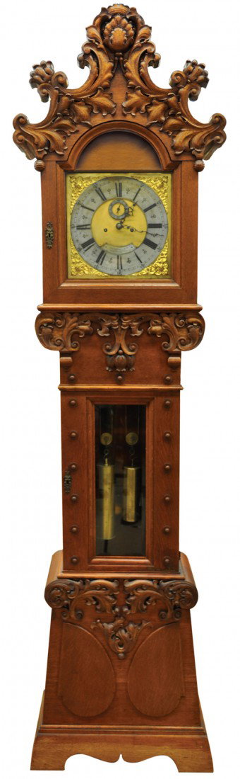 George C. Shreve tall case clock: Quartersawn oak tall case clock, San Francisco circa 1900, having a hand carved case with with acanthus and floral detail, the dial having Roman numerals and a second hand, and retains original retail