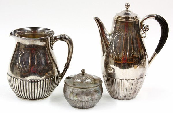 Georg Jensen, Dominic & Haff sterling: (lot of 3) 1930's Georg Jensen sterling silver two piece service in the ''Cosmos'' pattern, designed by Johan Rohde, consisting of a coffee pot and covered sugar, 35.41 troy oz.; together with an asso