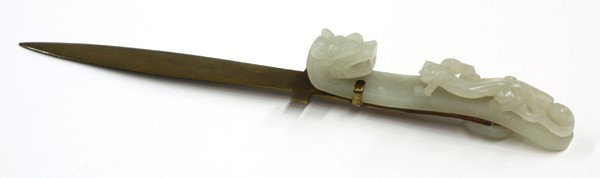 Chinese Jade Belt Hook/Letter Opener, Qing/Republ: Chinese celadon nephrite belt hook mounted to a letter opener, late Qing/Republic period, the jade belt hook carved with a strong featured dragon heightened with bulging eyes and a short snout, the bo