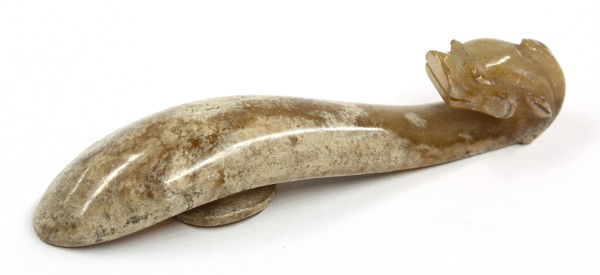 Chinese Jade Belt Hook, Qing: Chinese carved jade belt hook, Qing dynasty, the hook fashioned as the head of a dragon with protruding eyes, a short snout, pointed ears and a bifurcated horn, extending over a shaped shaft and rever