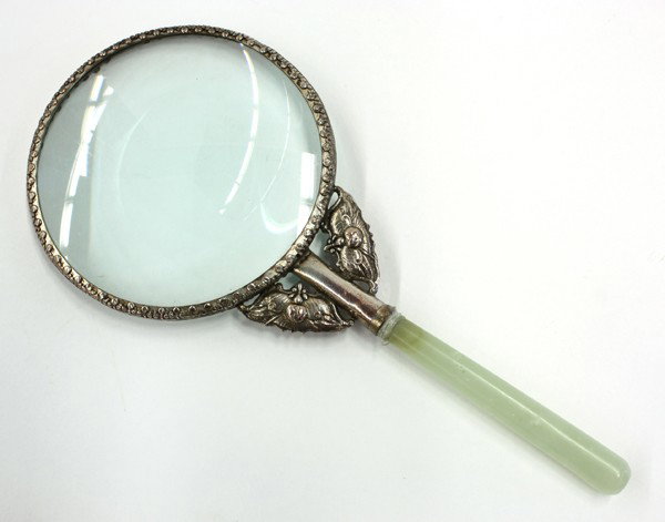 Chinese Magnifying Glass w/Green Hardstone Handle: Chinese magnifying glass with silver and hardstone mounting, the circular lens framed by a floral-accented and beaded silver band supported by a pair of auspicious bats bracketing the stem formed by a