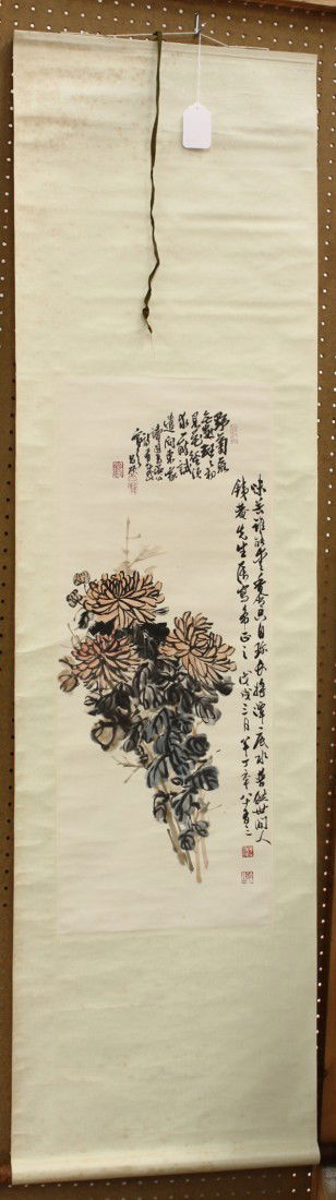 Chinese Scroll, Wu Changshuo/Chen Banding (after): Chinese hanging scroll, ink and color on paper, Chrysanthemums, after Wu Changshuo (Chinese, 1844-1927) and Chen Banding (1877-1970), the upper with a colophon and bearing the signature 'Wu Changshuo'
