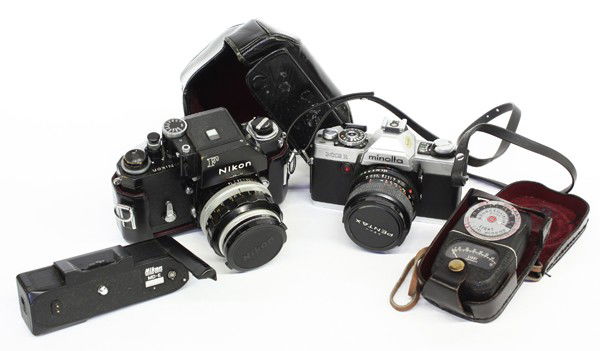 Camera group: (lot of 4) Cameras including a Nikon F SLR, Minolta XG 1, GE light exposure, and a Nikon MD-E motor drive