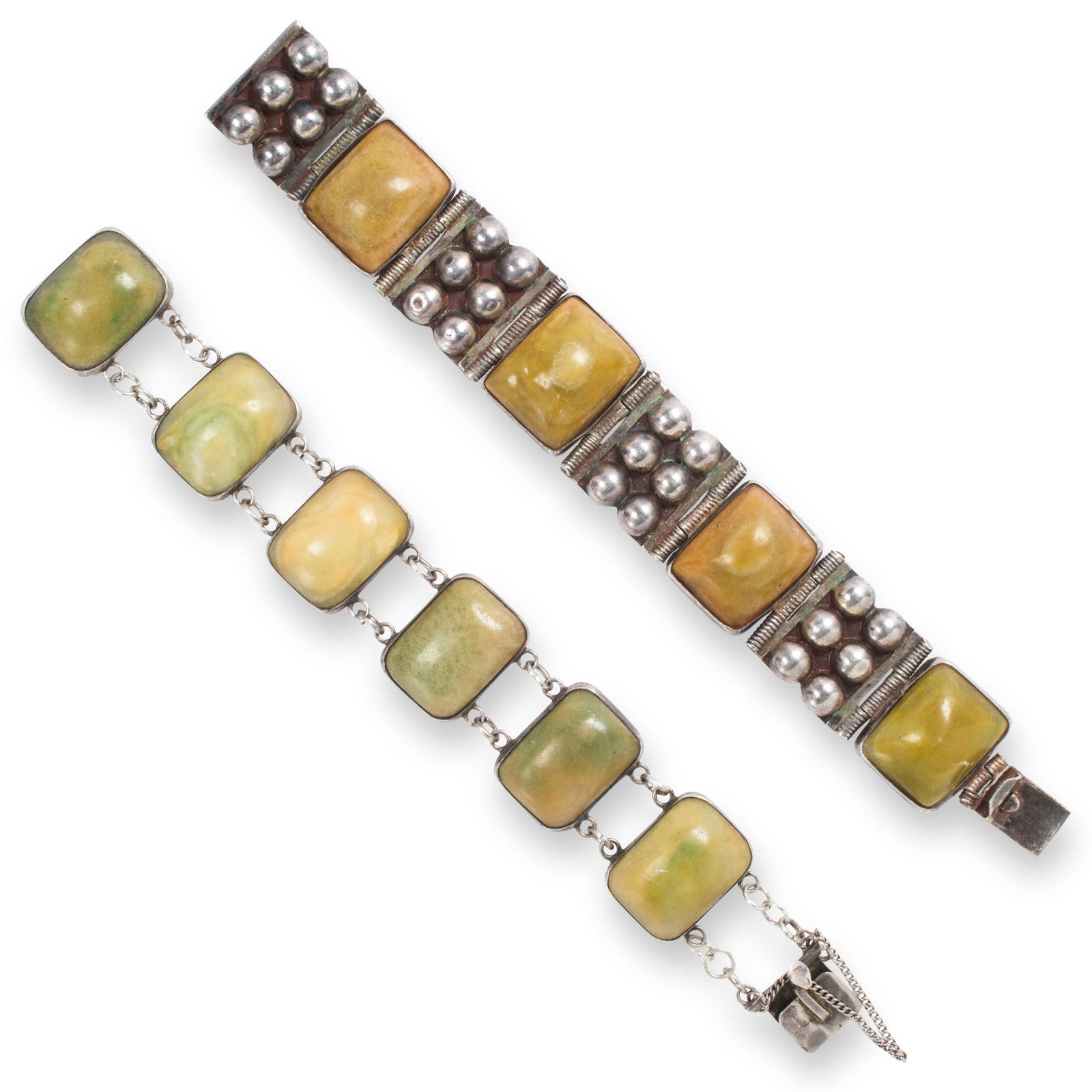 A group of hardstone bracelets: A group of hardstone braceletsincluding two link bracelets set with hardstone tablet, in silver. 4.285 gross ozt; lengths; 7 1/4 - 7 1/2