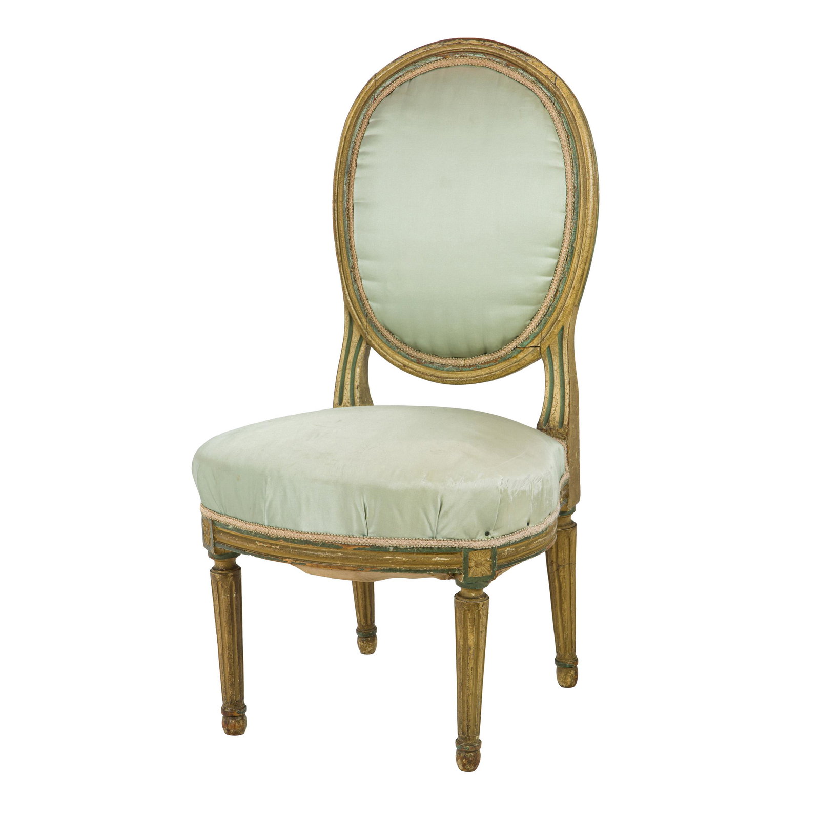 A Louis XVI style boudoir chair: A Louis XVI style boudoir chair, molded oval back with shaped seat and fluted legs. Painted wood and silk, mid 20th c. Property from the estate of Patricia Moffat Pope, San Francisco, CA, Mrs. Pope wa