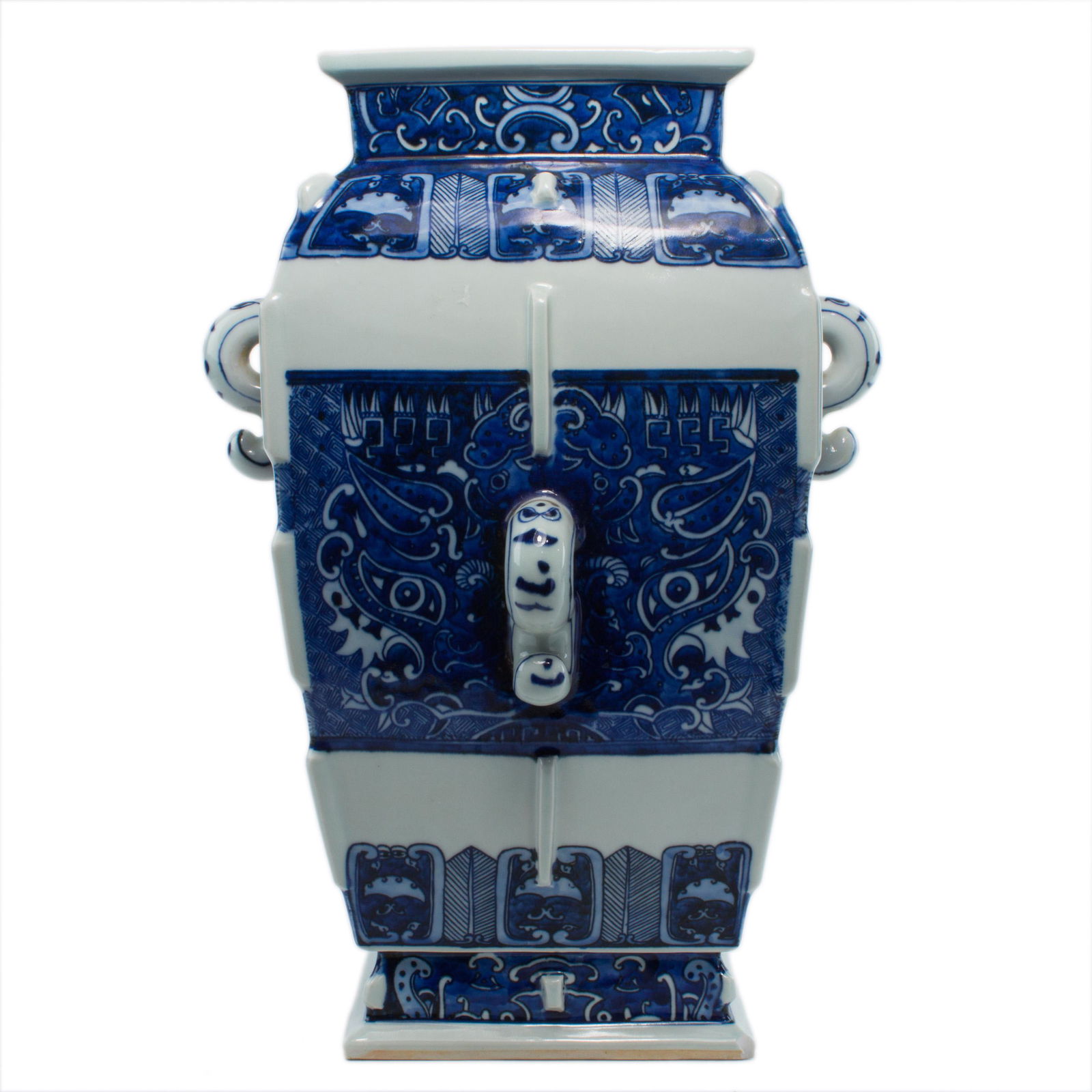 Chinese blue and white square-form zun vase: Chinese blue and white square-form zun vase, each side featuring a large Taotie mask and an elephant-nose-form handle, the recesses base displaying a six-character Qianlong mark, 14.5"h.